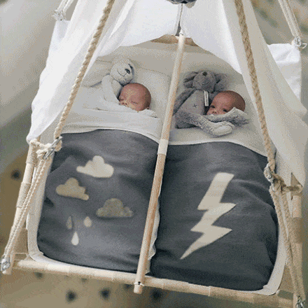 Twin top baby swing